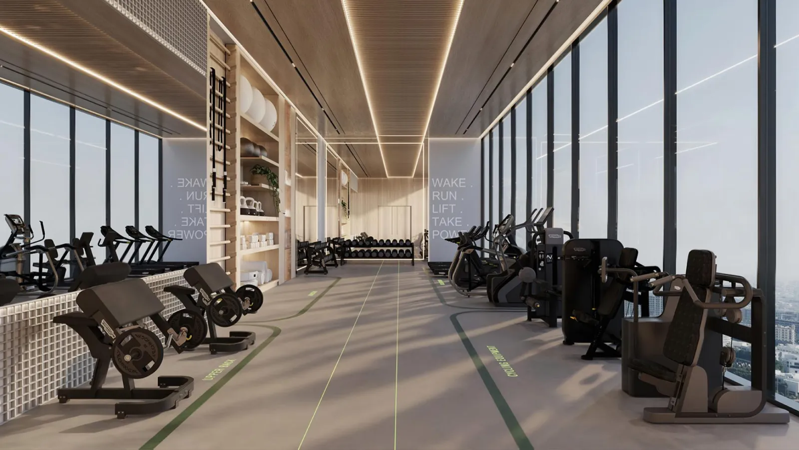 Rooftop gym at South Haven Samana with cardio and resistance equipment along a glazed wall