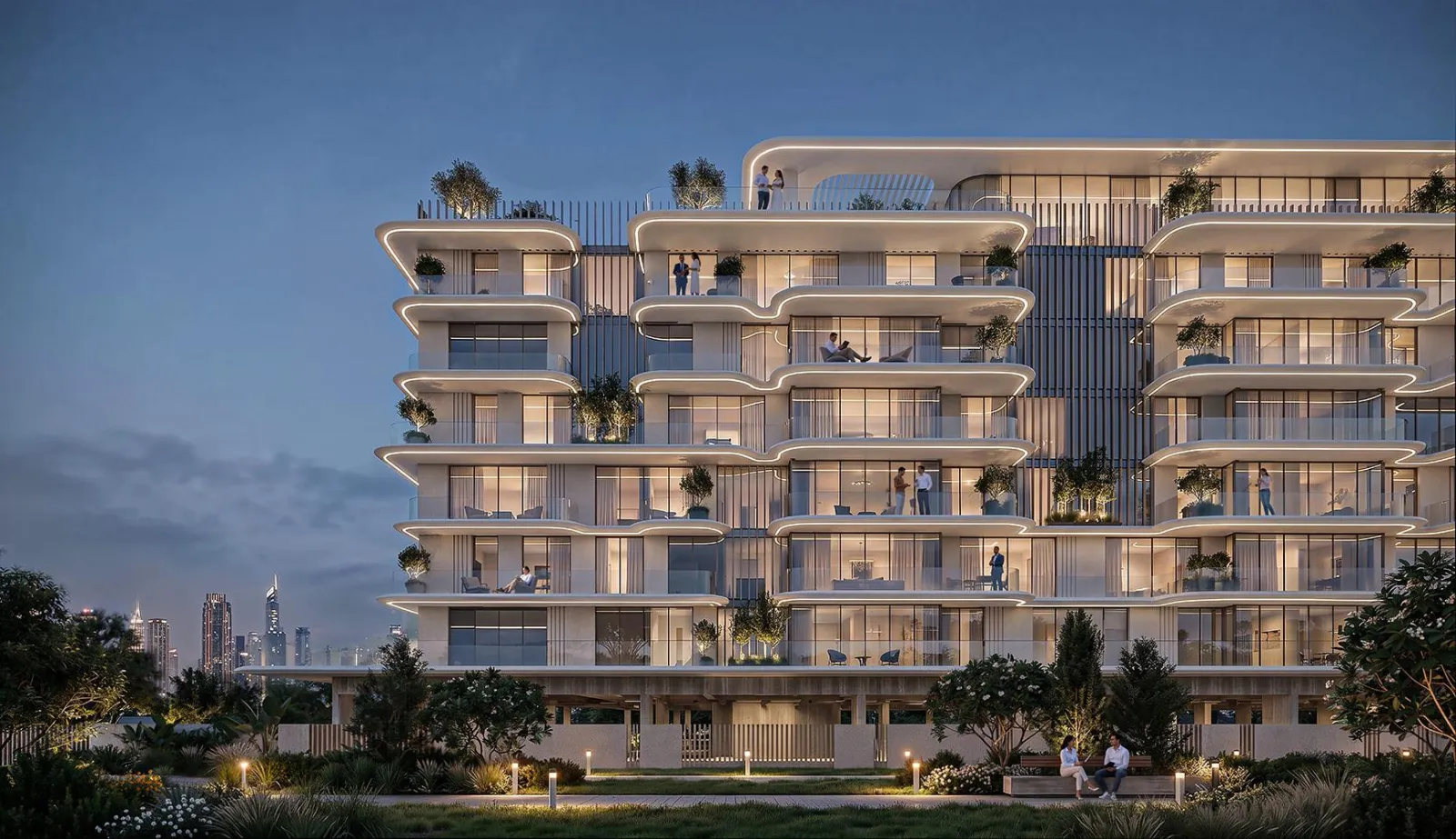 Lit balconies and curved terraces on the South Haven Samana facade in Dubai South